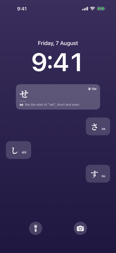 an iphone lockscreen showing せ with the reading se, plus three smaller kana tiles