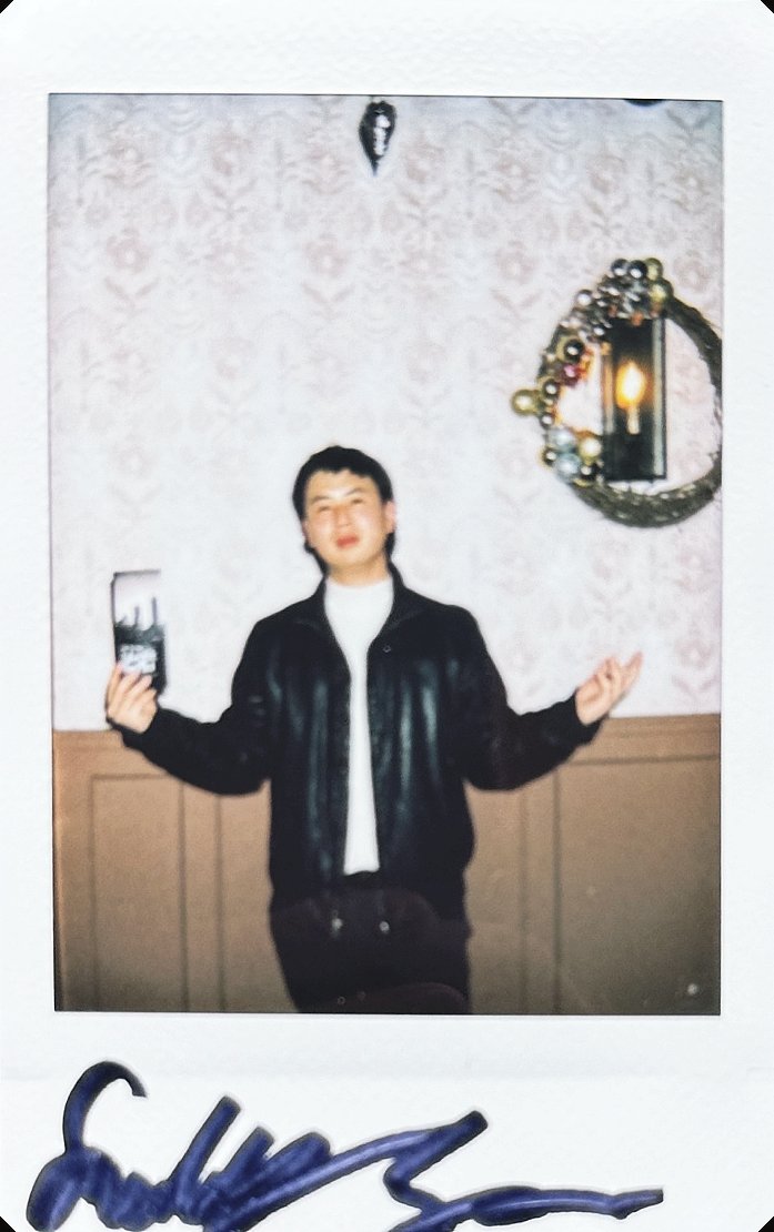 signed polaroid from take 001, no. 14