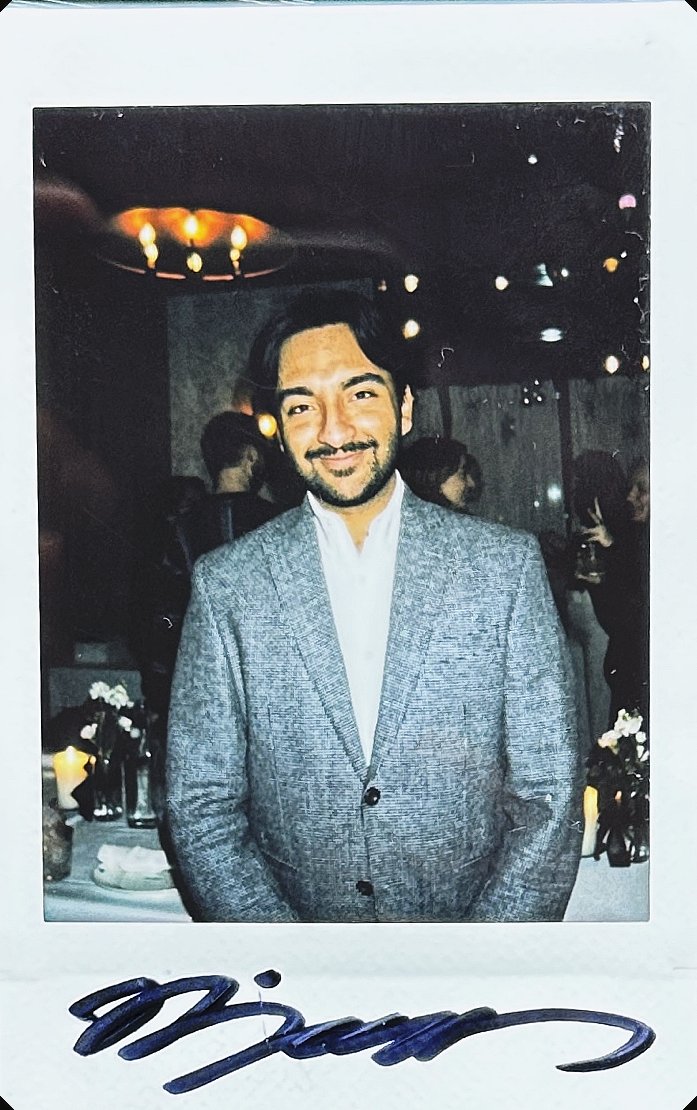 signed polaroid from take 001, no. 7