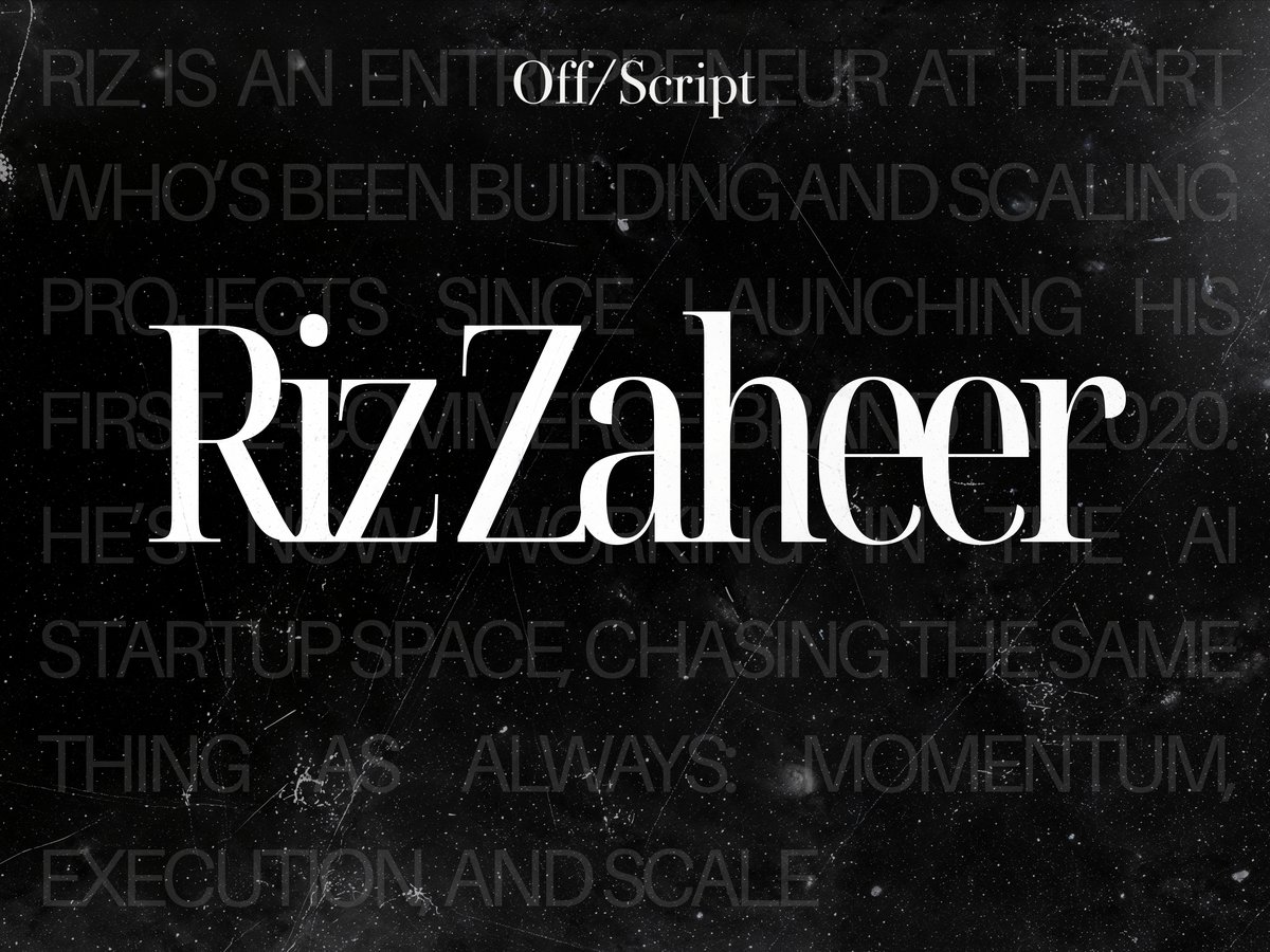 a black film-grain name card with a guest's name in a serif typeface