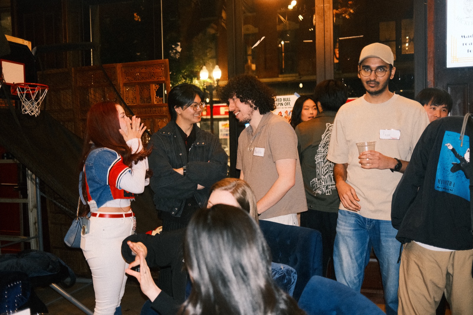 a standing circle cracking up between rounds at vol 1