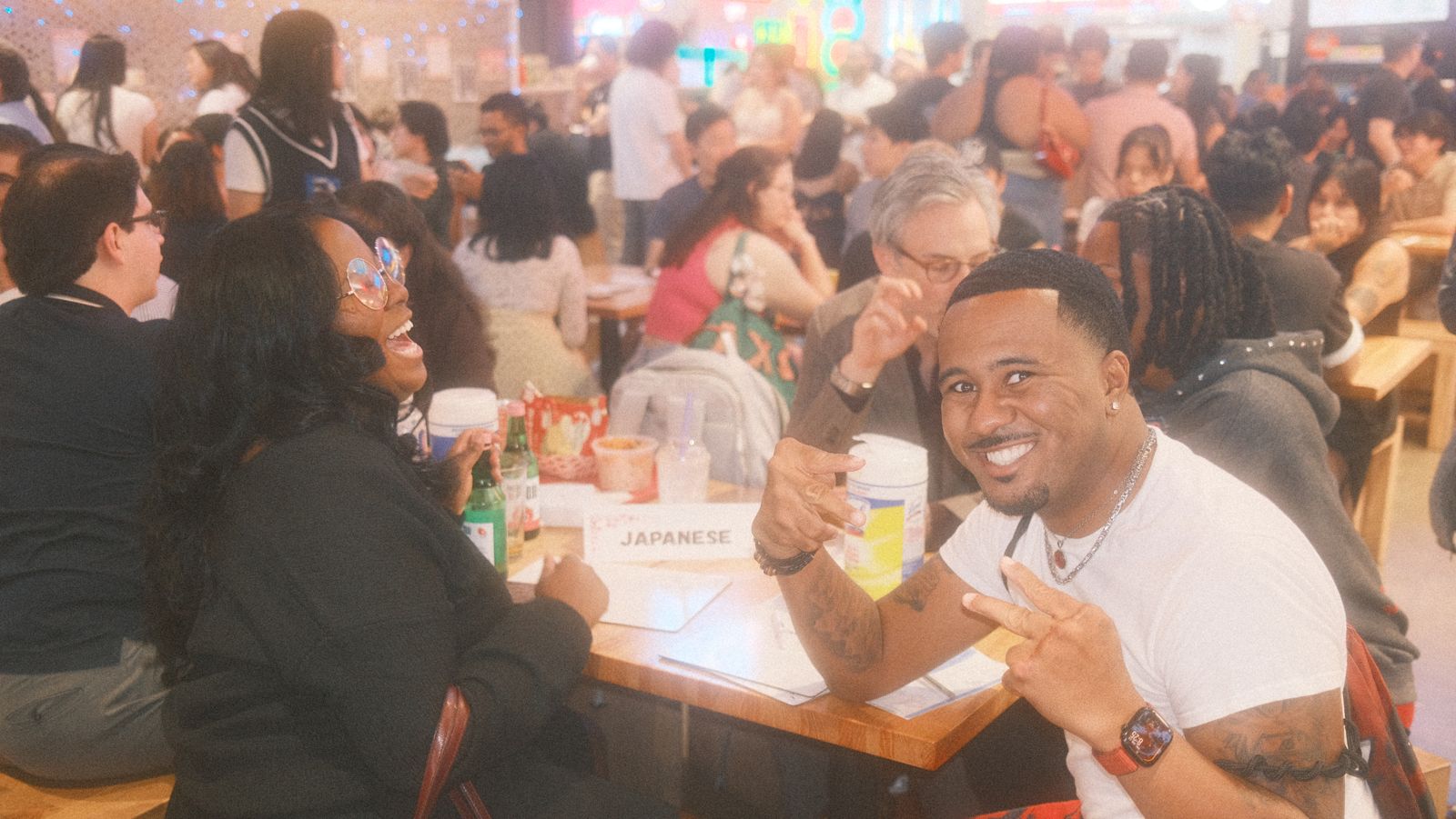 peace signs at the japanese table, soju bottles out