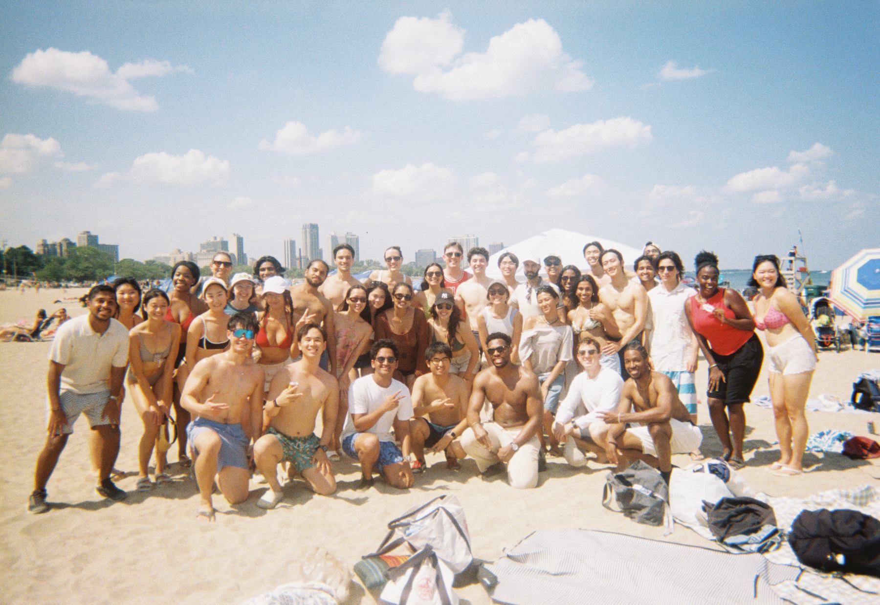 the whole beach social lined up on the sand at north avenue beach
